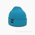 Fashion Solid Color Knitted Hat with Woven Lable